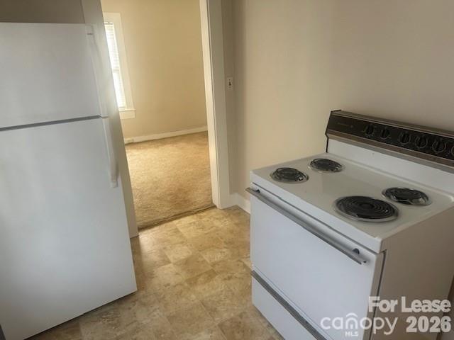 4911 Monroe Road Charlotte, NC 28205 - Photo 9 of 15 a utility room with dryer and washer