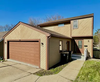 a view of a house with garage