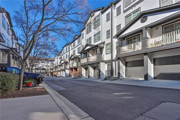 a view of a building with a street