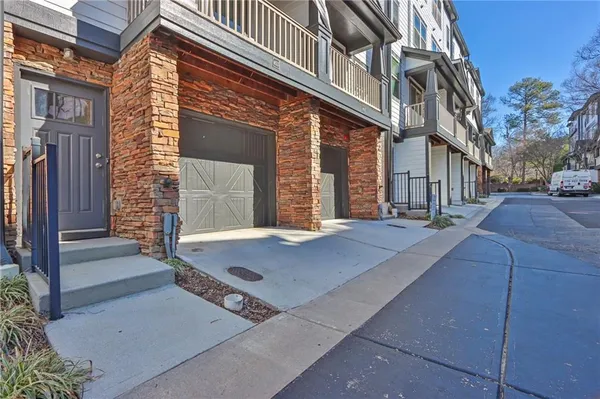 a view of a brick building with many windows