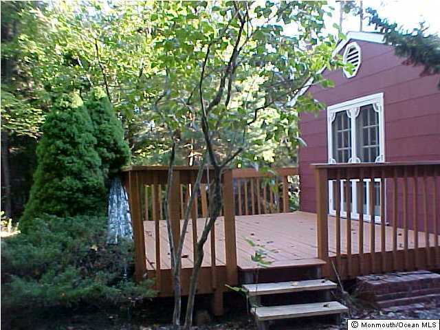526 Diamond Road Jackson, NJ 08527 - Photo 3 of 3 a view of balcony with wooden floor and fence