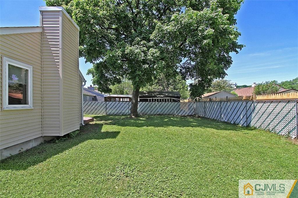 32 Ramsey Road Middlesex, NJ 08846 - Photo 23 of 25 a view of a backyard with a garden