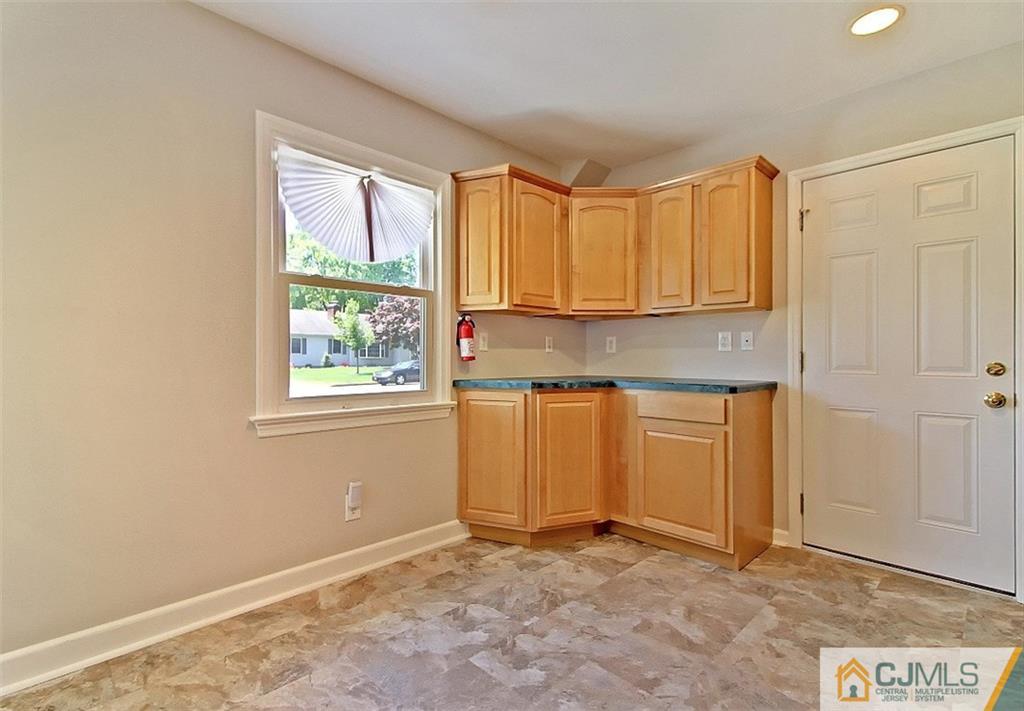32 Ramsey Road Middlesex, NJ 08846 - Photo 10 of 25 a view of kitchen with window and cabinets