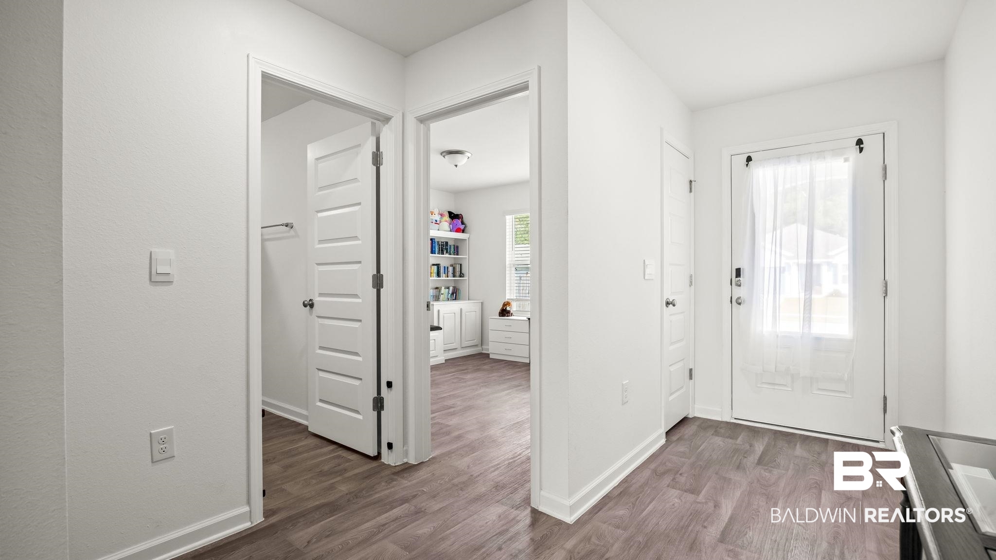 24264 Veranda Circle Elberta, AL 36530 - Photo 32 of 41 Entryway featuring dark wood-style flooring and baseboards