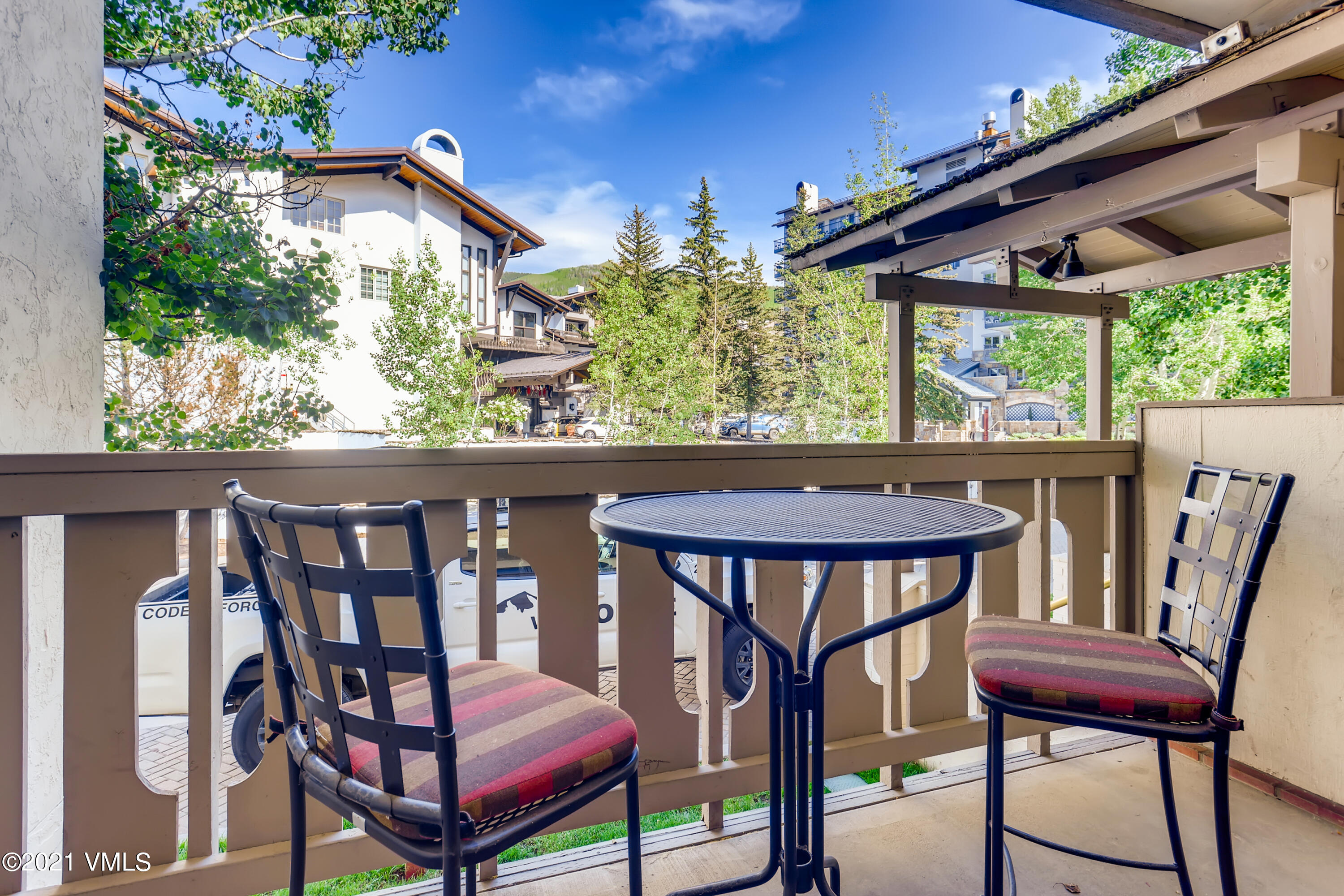 133 Willow Bridge Road, Unit 625 Vail, CO 81657 - Photo 18 of 26 a view of a chairs and table in the patio