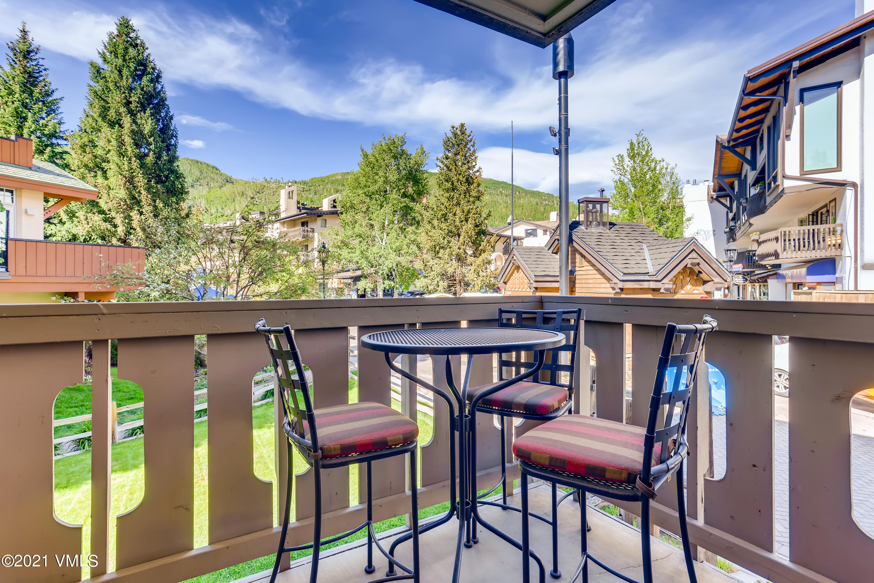 133 Willow Bridge Road, Unit 625 Vail, CO 81657 - Photo 5 of 26 a view of a chairs and table in the balcony