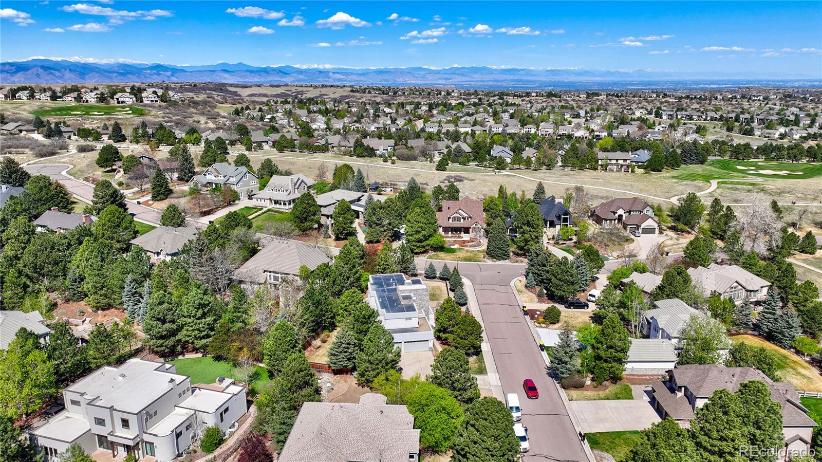 7963 Glen Ridge Drive Castle Pines, CO 80108 - Photo 46 of 48 an aerial view of residential houses with outdoor space