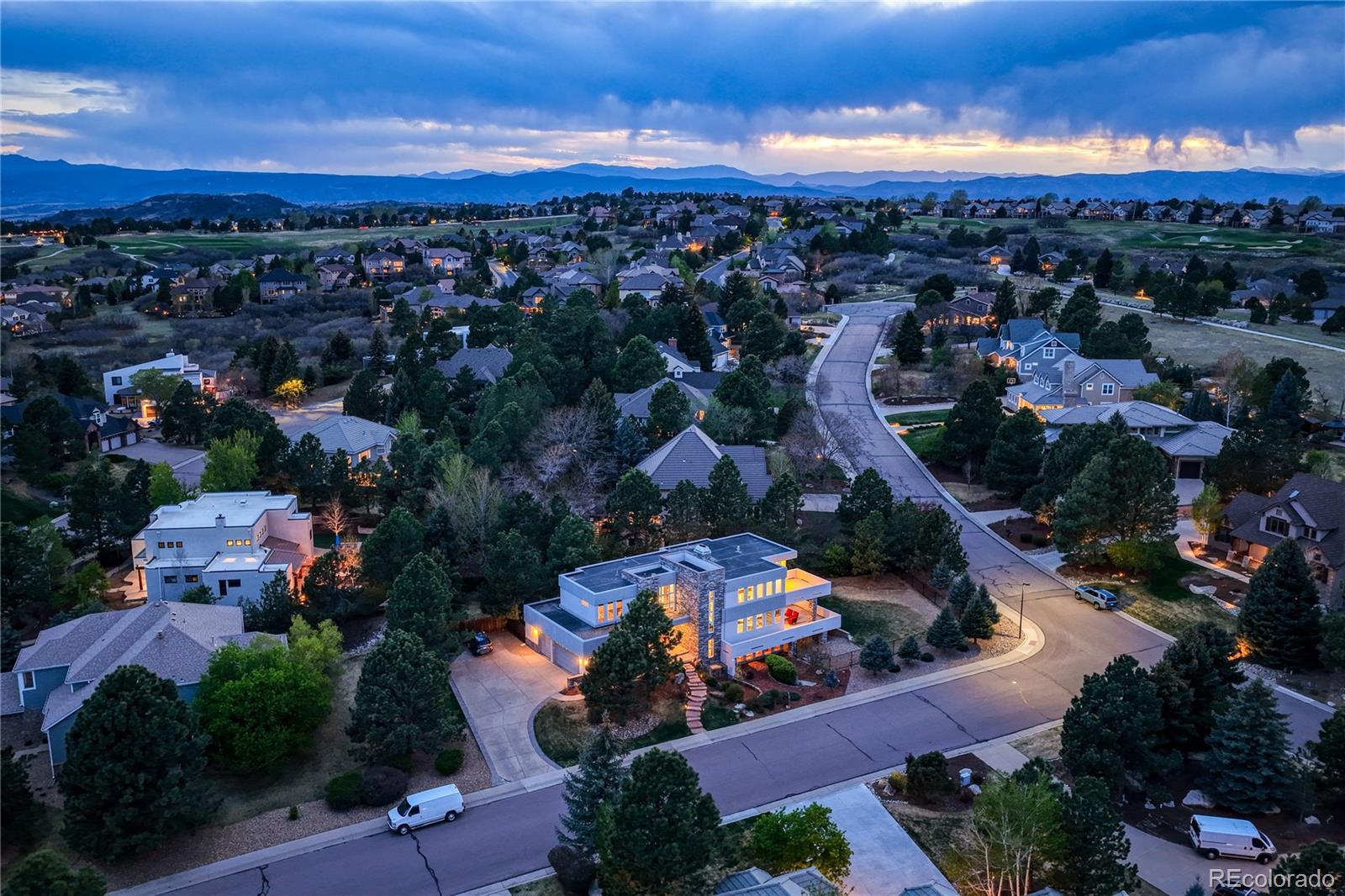 7963 Glen Ridge Drive Castle Pines, CO 80108 - Photo 6 of 48 an aerial view of residential houses and city street