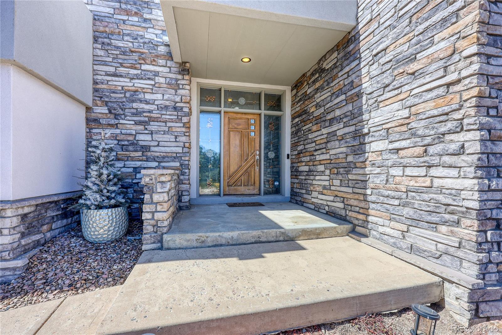 7963 Glen Ridge Drive Castle Pines, CO 80108 - Photo 8 of 48 a view of an entryway