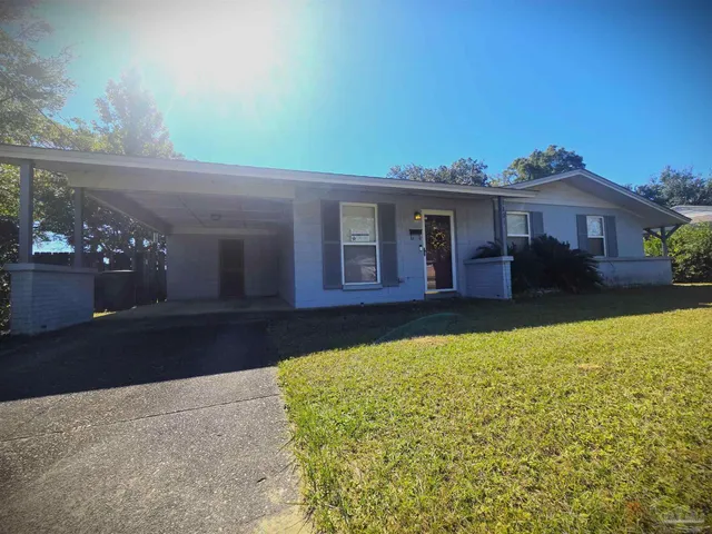a front view of a house with yard
