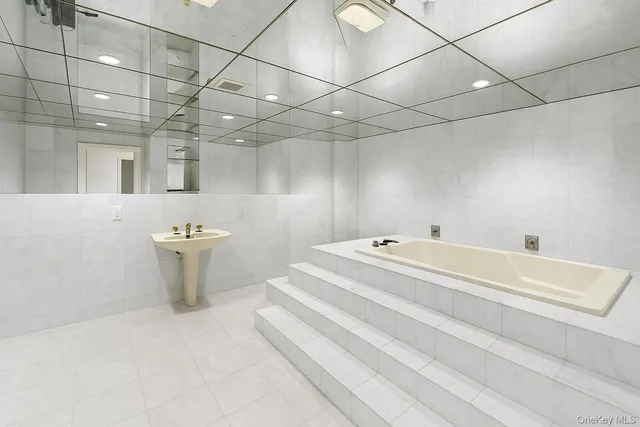 a view of a room with lots of wooden furniture and a wooden floor