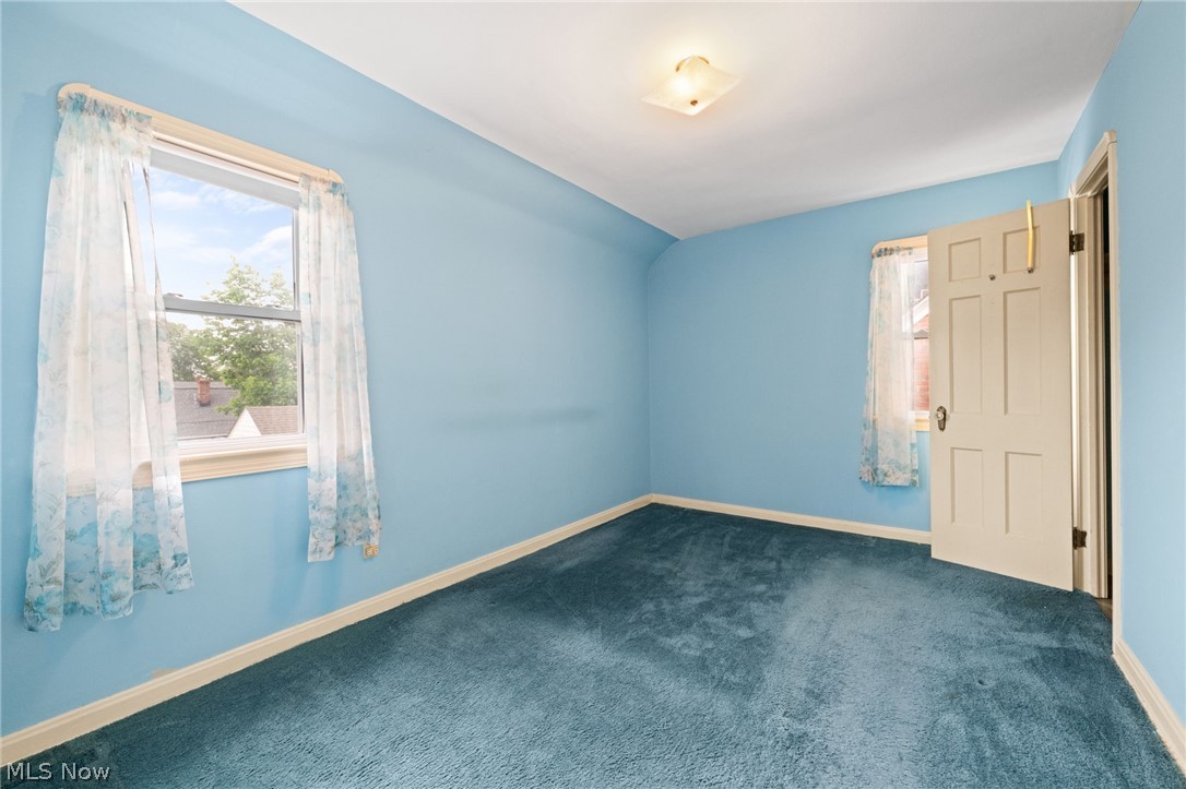 13311 Grannis Road Cleveland, OH 44125 - Photo 15 of 32 Hardwood floors underneath carpet