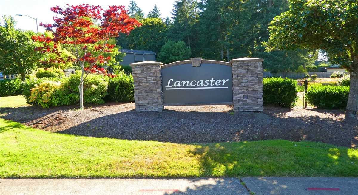 2513 Hidden Springs Loop Southeast Lacey, WA 98503 - Photo 2 of 40 a sign board with a park park