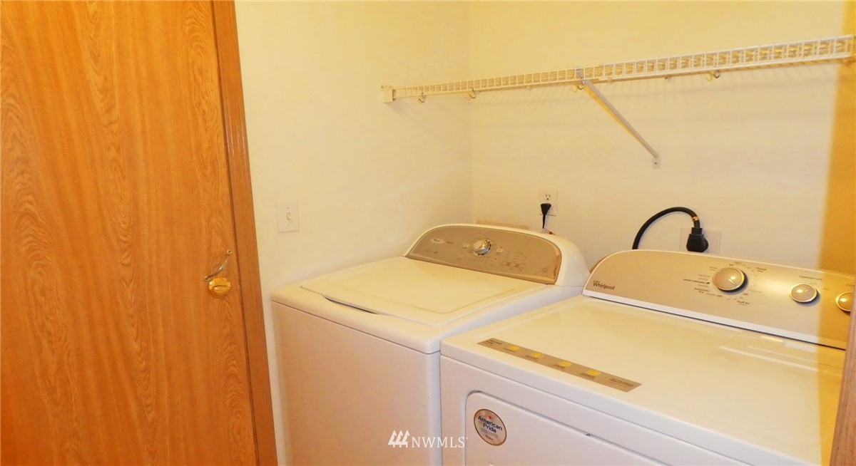 2513 Hidden Springs Loop Southeast Lacey, WA 98503 - Photo 20 of 40 a utility room with dryer and washer