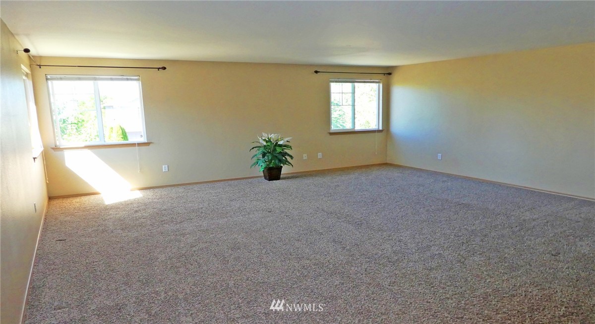 2513 Hidden Springs Loop Southeast Lacey, WA 98503 - Photo 24 of 40 an empty room with windows