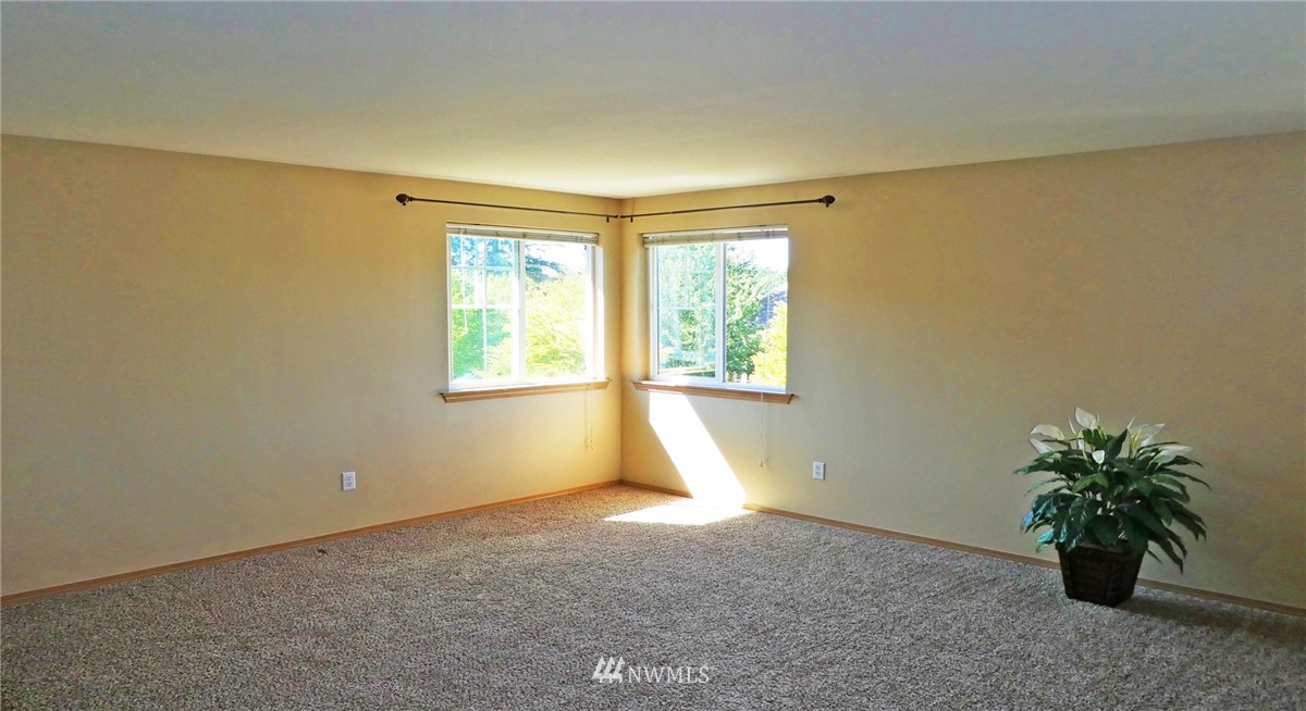 2513 Hidden Springs Loop Southeast Lacey, WA 98503 - Photo 25 of 40 an empty room with windows