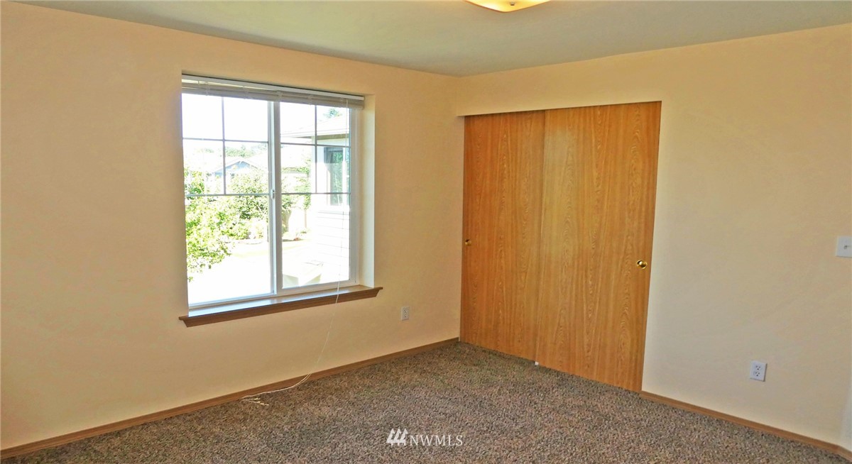 2513 Hidden Springs Loop Southeast Lacey, WA 98503 - Photo 31 of 40 an empty room with windows