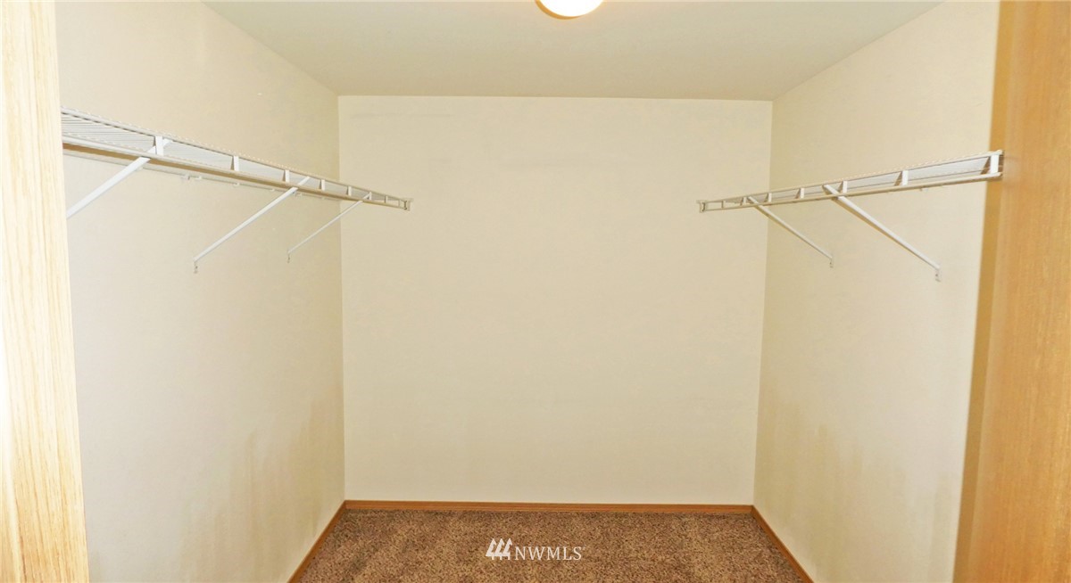 2513 Hidden Springs Loop Southeast Lacey, WA 98503 - Photo 33 of 40 a view of an empty walk in closet