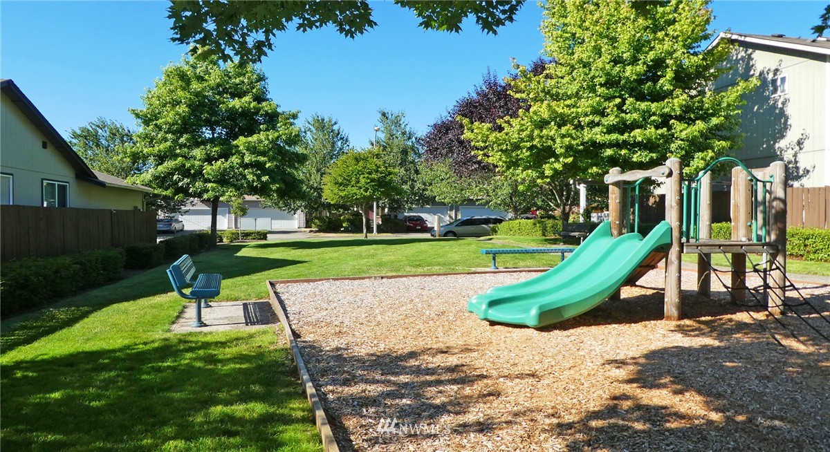 2513 Hidden Springs Loop Southeast Lacey, WA 98503 - Photo 36 of 40 a view of a garden with a slide