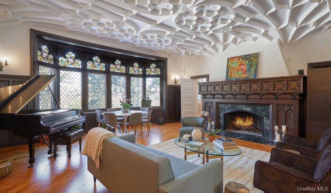 61 Crows Nest Road, Unit 6 Tuxedo Park, NY 10987 - Photo 5 of 14 a living room with furniture and a fireplace