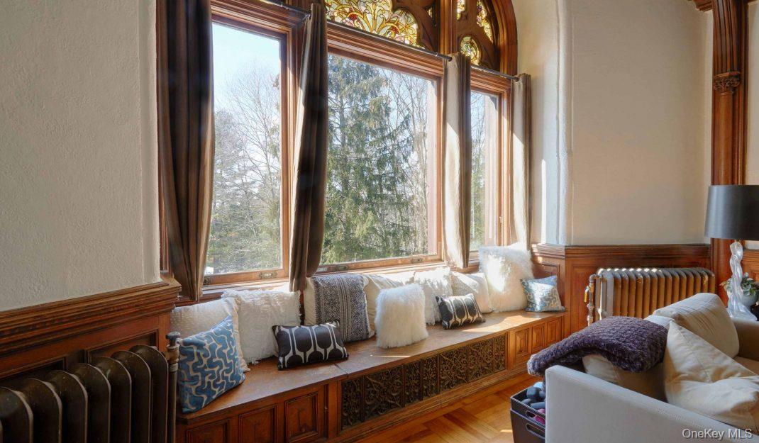 61 Crows Nest Road, Unit 6 Tuxedo Park, NY 10987 - Photo 9 of 14 a living room with furniture and a window