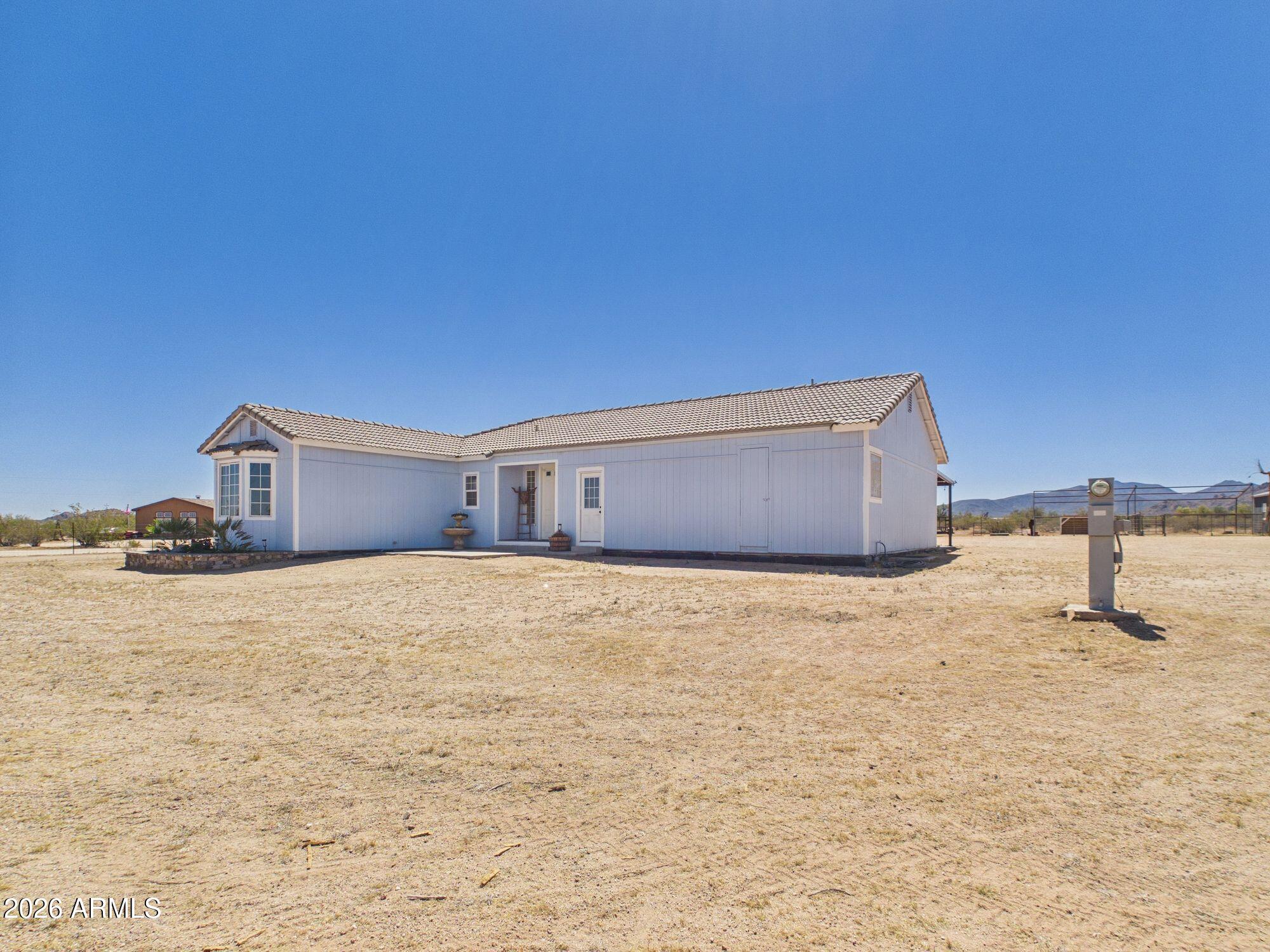 51491 West Dune Shadow Road Maricopa, AZ 85139 - Photo 25 of 33 a house with a outdoor space