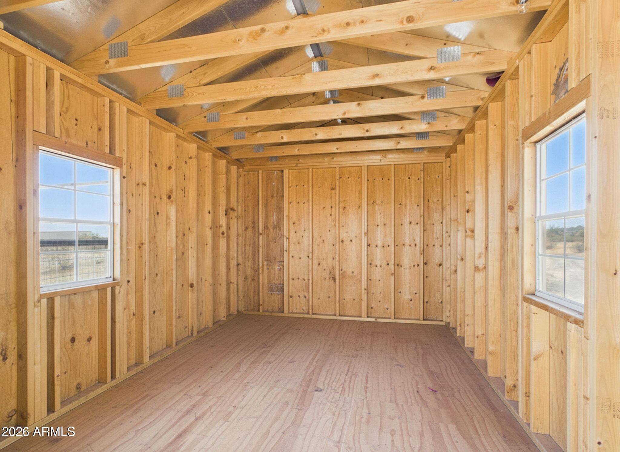 51491 West Dune Shadow Road Maricopa, AZ 85139 - Photo 27 of 33 a view of a hallway with wooden floor and entryway