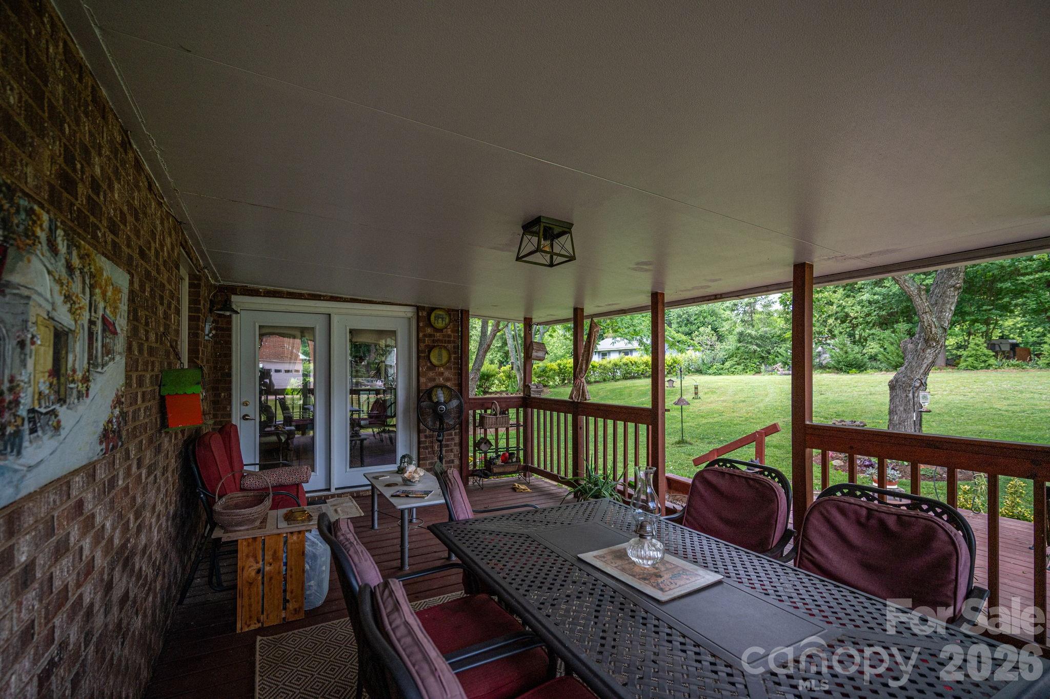 3815 Wildcherry Road Shelby, NC 28150 - Photo 25 of 33 a living room with furniture and a floor to ceiling window