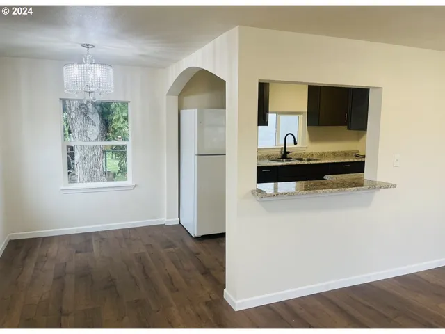 a view of a living room and window