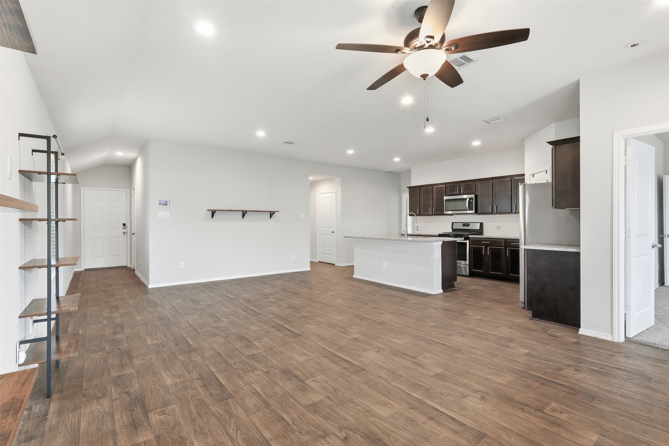 2346 Gold Forsythia Ln Spring Spring, TX 77373 - Photo 13 of 39 Open-concept kitchen seamlessly connects to the breakfast and living areas.