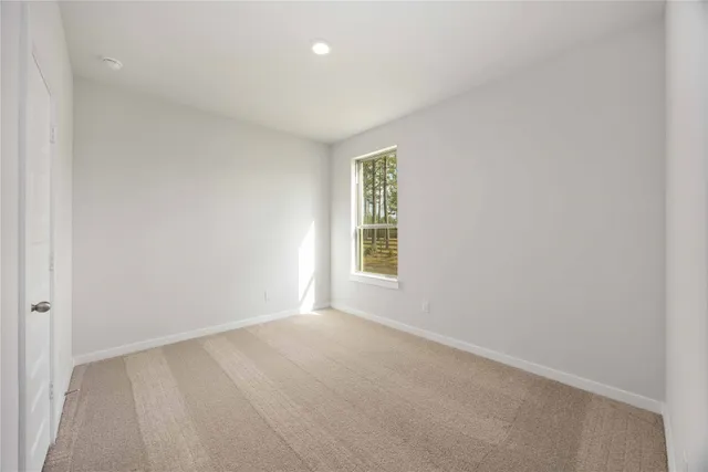 an empty room with a window