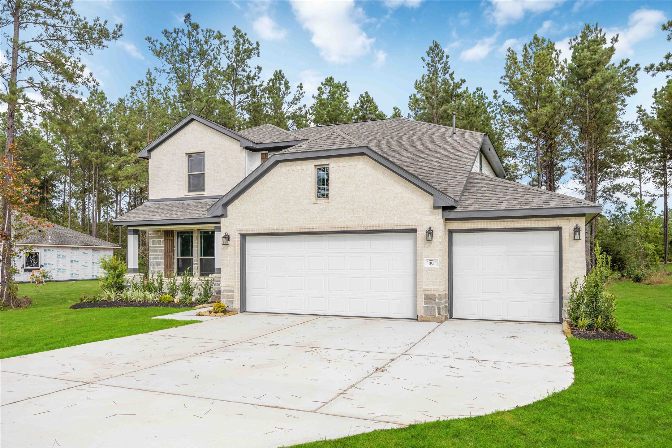 13511 Caldwell Street Conroe, TX 77303 - Photo 2 of 29 front view of house with a yard