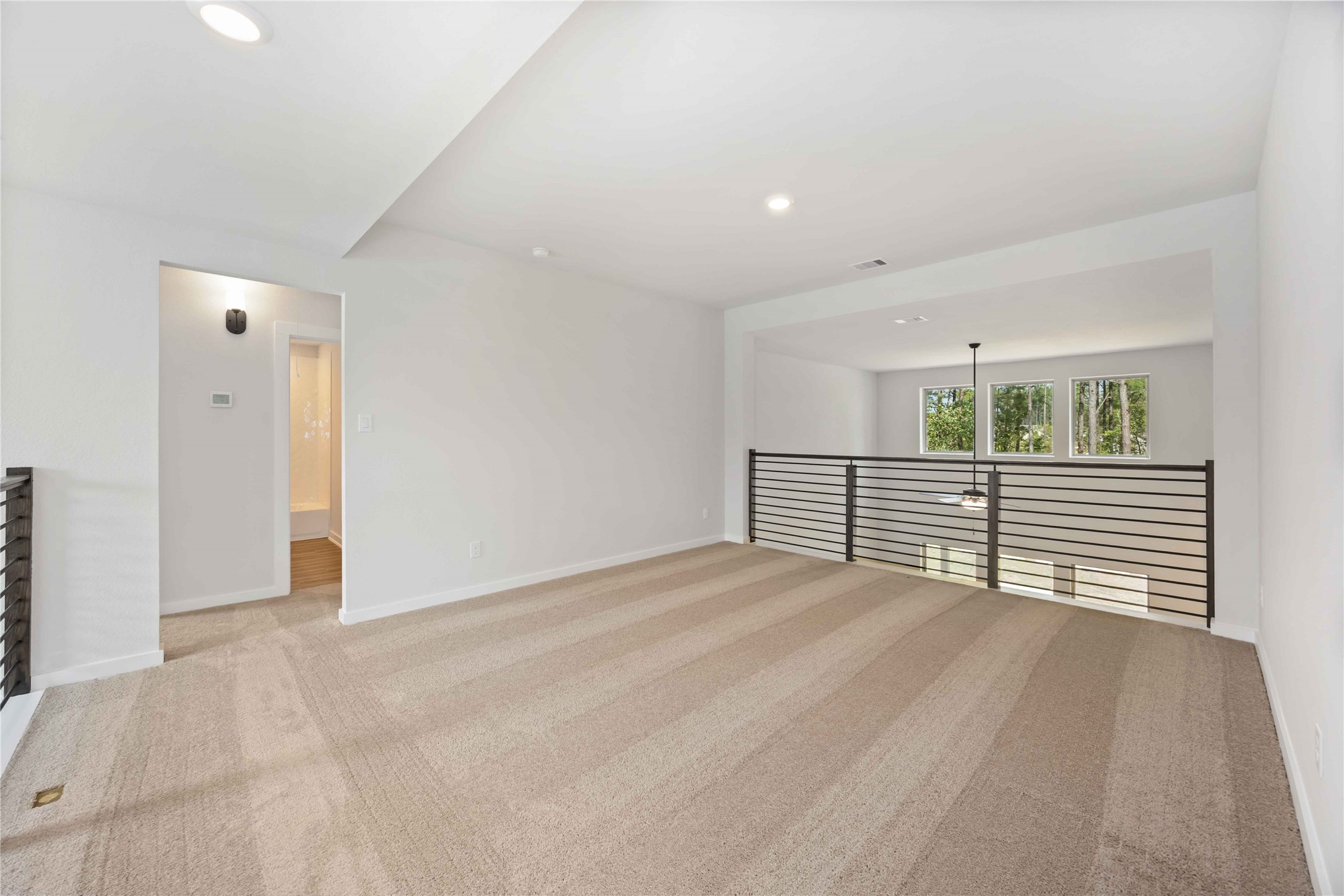 13511 Caldwell Street Conroe, TX 77303 - Photo 21 of 29 a view of an empty room with a window