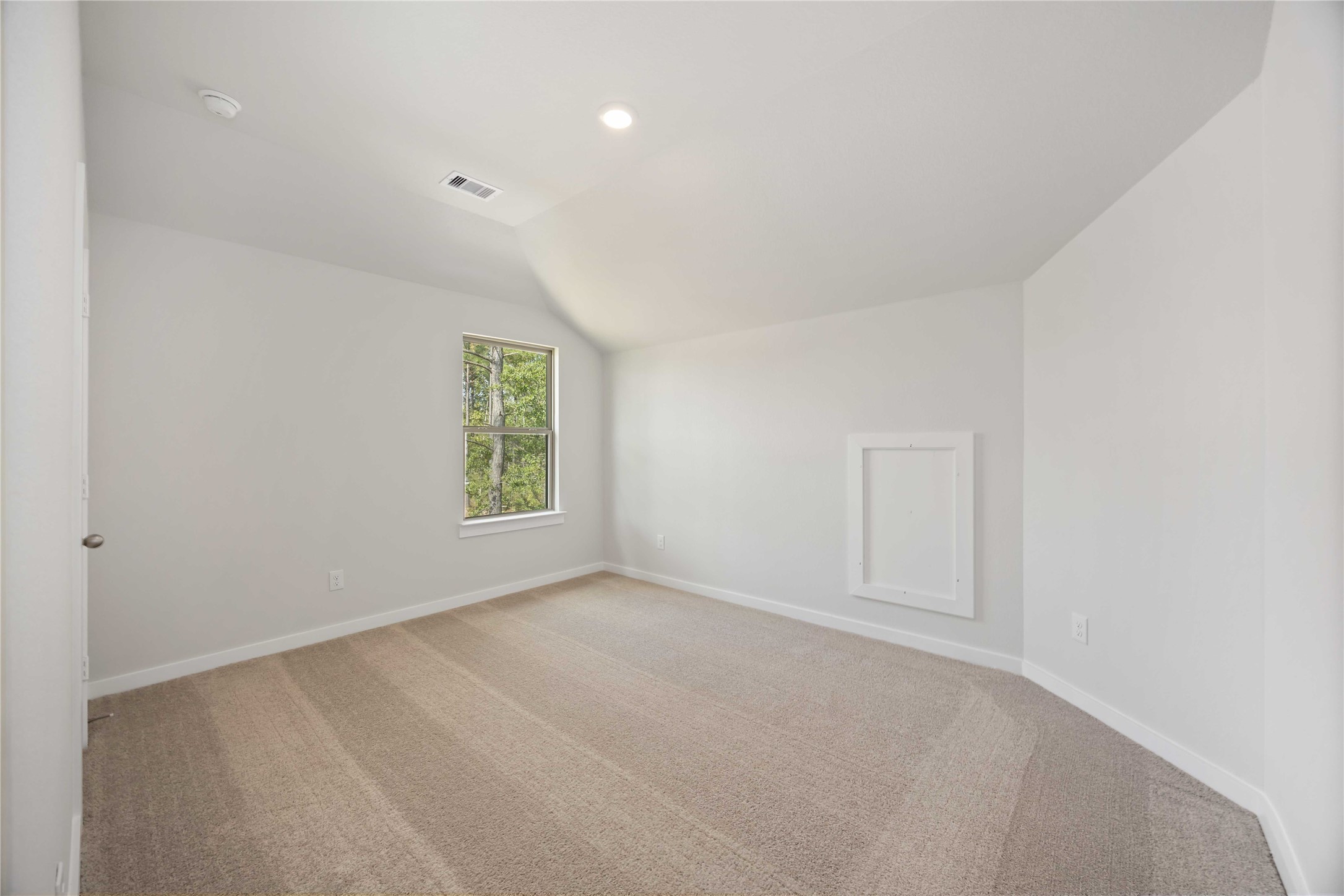 13511 Caldwell Street Conroe, TX 77303 - Photo 25 of 29 a view of an empty room with a window