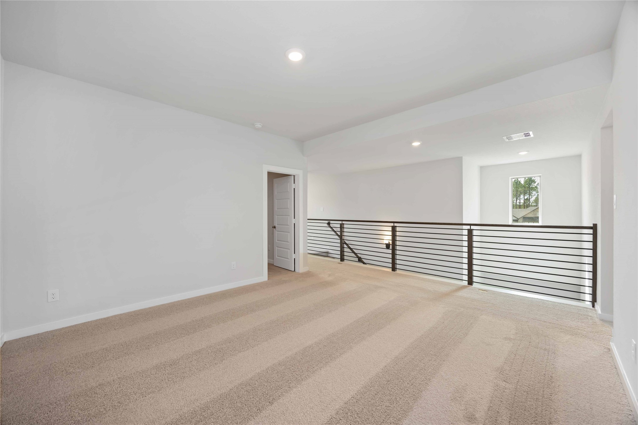 13511 Caldwell Street Conroe, TX 77303 - Photo 26 of 29 a view of a livingroom with a large window