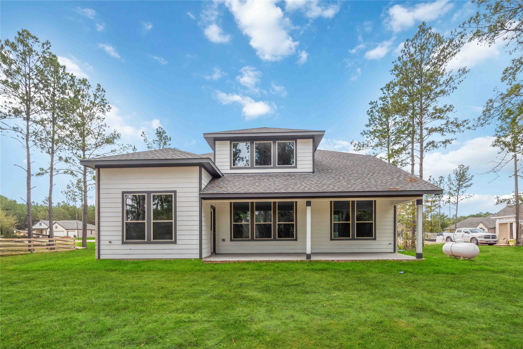 13511 Caldwell Street Conroe, TX 77303 - Photo 28 of 29 a front view of a house with a garden