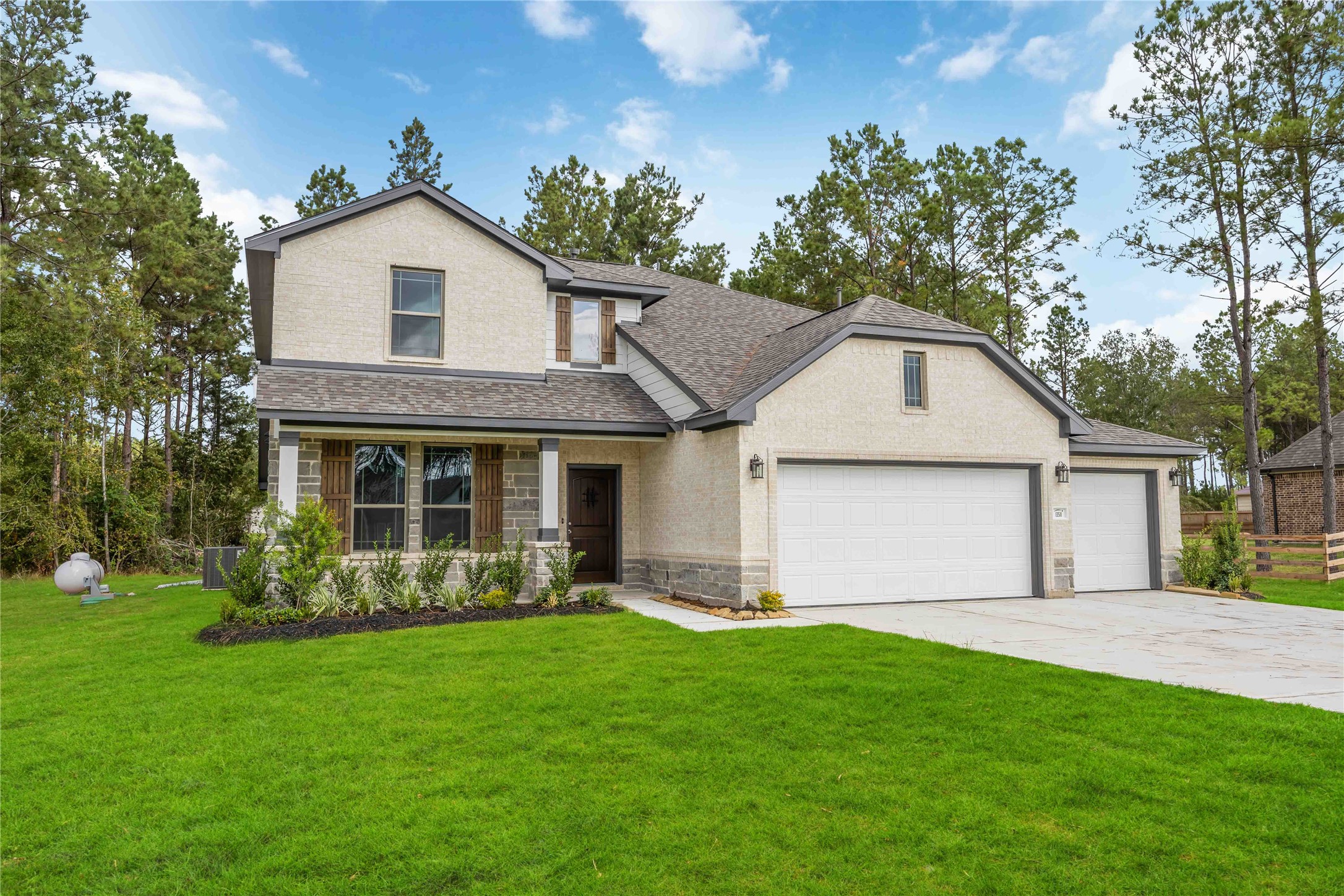 13511 Caldwell Street Conroe, TX 77303 - Photo 29 of 29 a front view of a house with garden