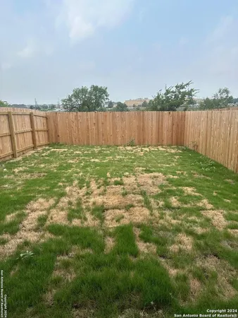 a view of outdoor space with deck and backyard