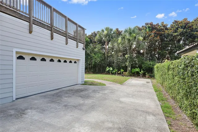 a view of backyard with a small pool