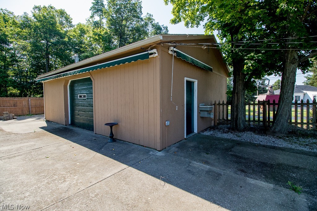 9485 Johnnycake Ridge Road Mentor, OH 44060 - Photo 14 of 16 rear view of 3 car garage