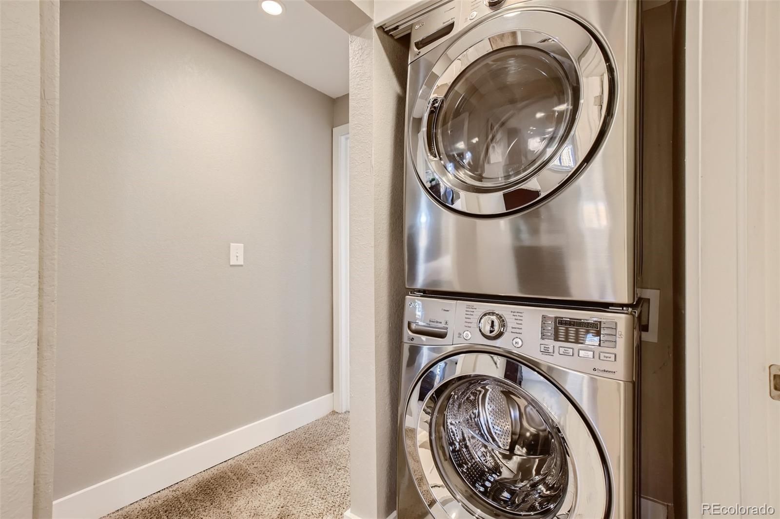 2310 South Decatur Street Denver, CO 80219 - Photo 20 of 27 a view of washer and dryer in a utility room