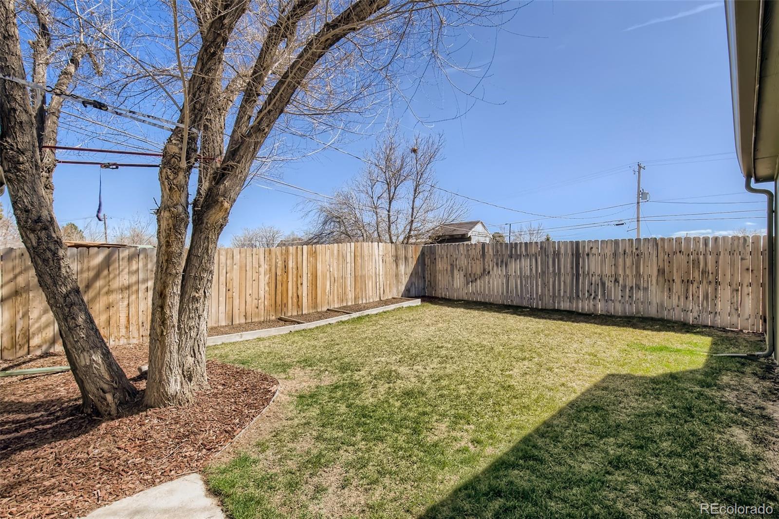 2310 South Decatur Street Denver, CO 80219 - Photo 24 of 27 a view of a backyard