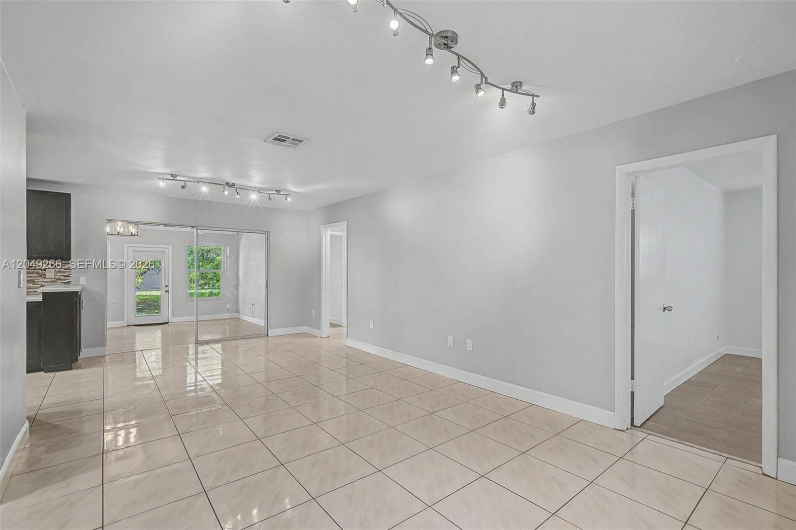 11860 Southwest 81st Road, Unit 11860 Pinecrest, FL 33156 - Photo 8 of 24 Dining/Living/Family
