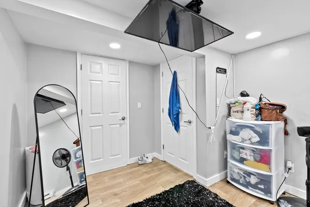 a view of an entryway with front door