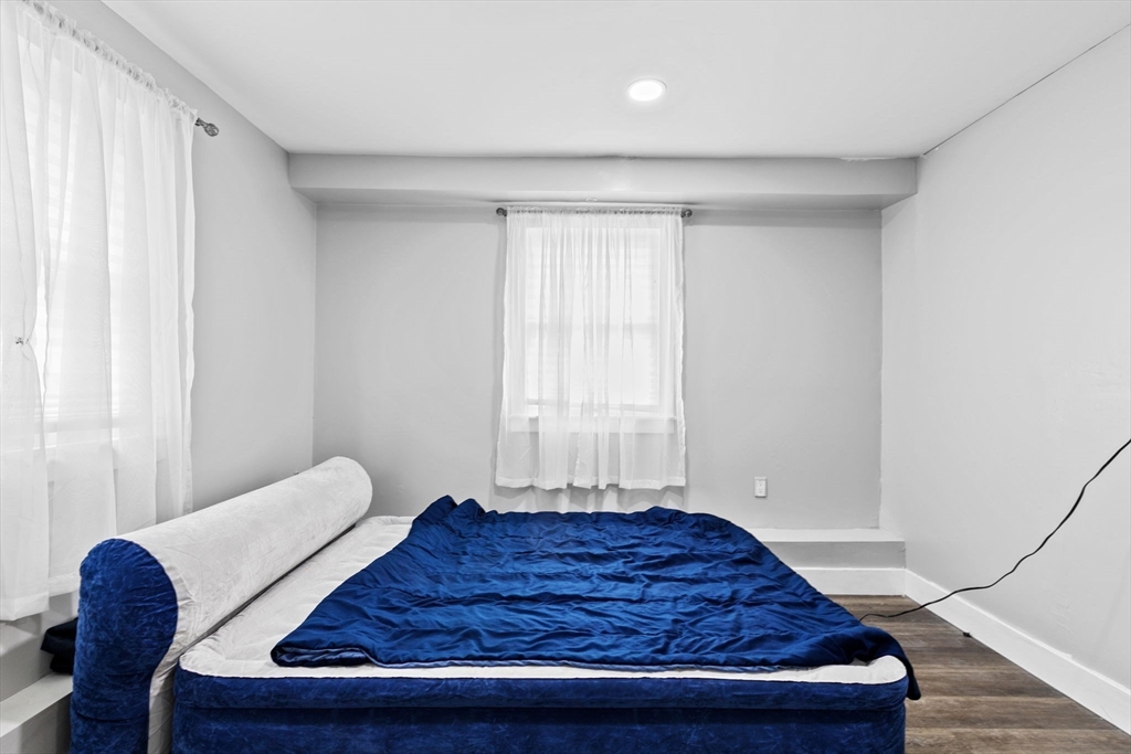 137 Westboro Road North Grafton, MA 01536 - Photo 21 of 36 a bedroom with a bed and a window