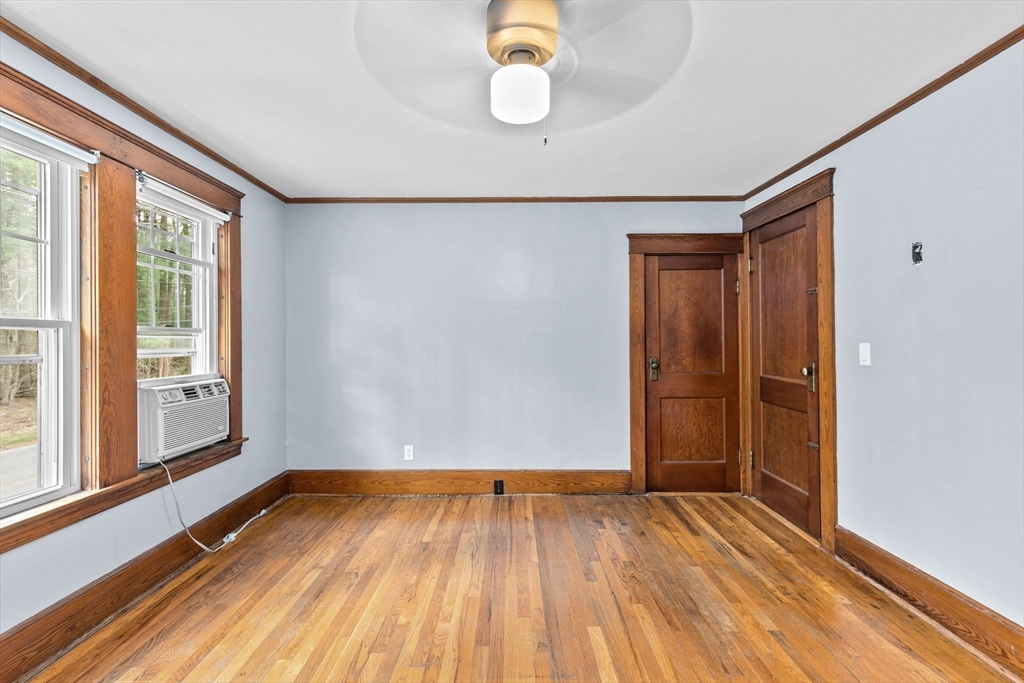 137 Westboro Road North Grafton, MA 01536 - Photo 34 of 36 a view of an empty room with wooden floor and window