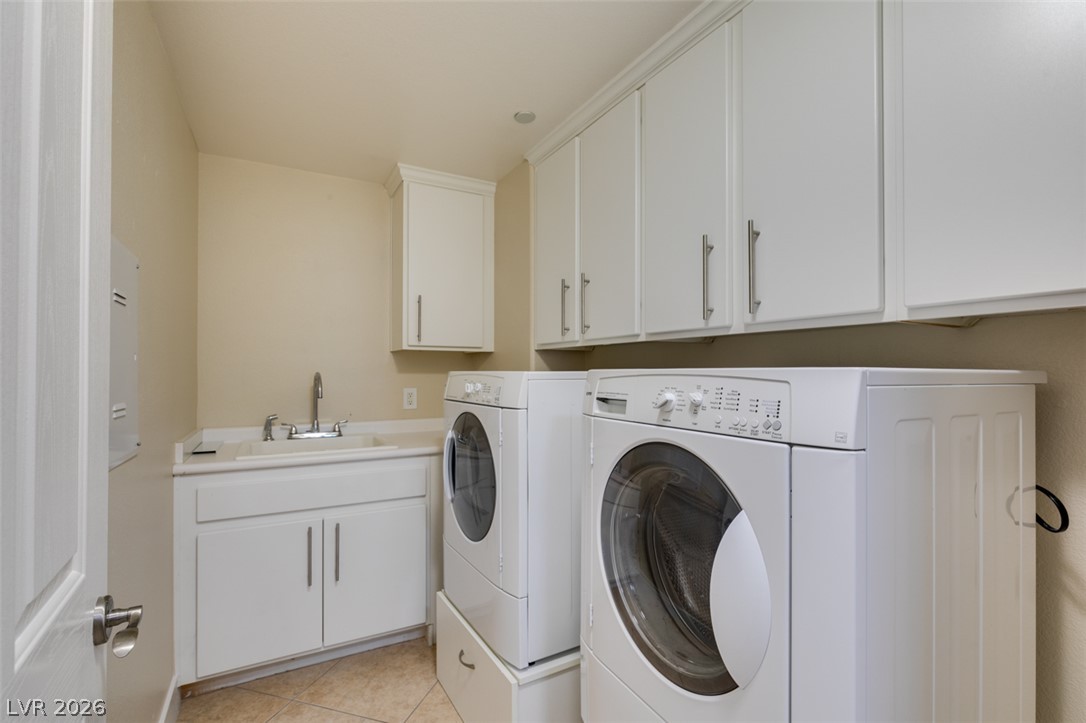 2555 Hampton Road, Unit 3203 Henderson, NV 89052 - Photo 34 of 43 Ample built-in cabinetry provides extensive storage in this practical laundry room.