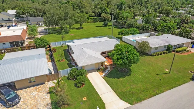an aerial view of a house with a garden