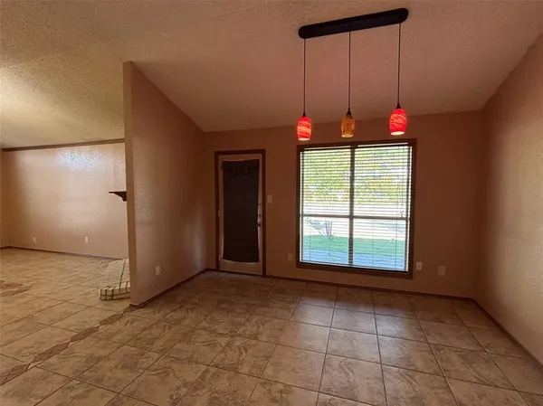 a view of a livingroom with a window