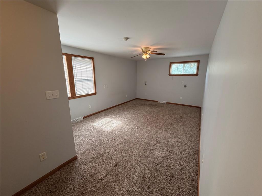 526 East River Road Edinburg, PA 16116 - Photo 21 of 45 an empty room with a empty space and windows